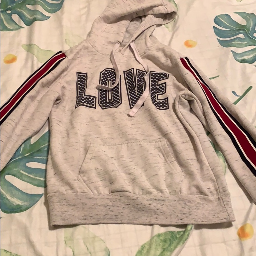 white hoodie with red white and blue stripes
